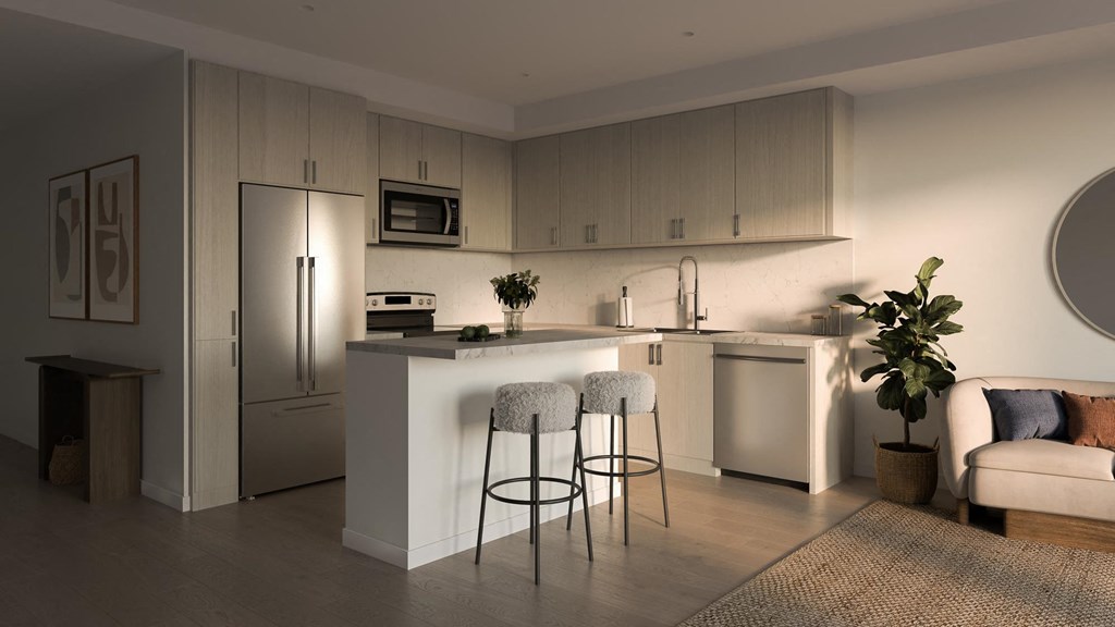 a kitchen with a counter top and a refrigerator