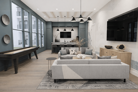 A modern living room with a grey sofa and a wooden coffee table.