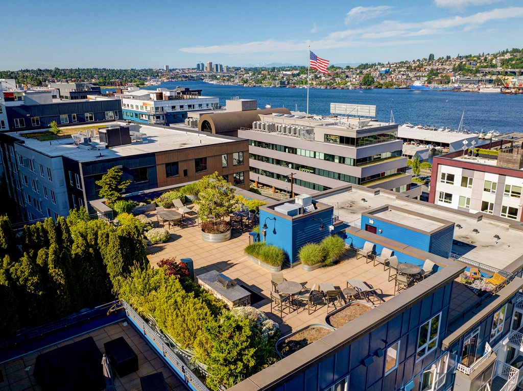 a view from above of a building with a flag on top and a body of water in  at Dexter Lake Union, Seattle