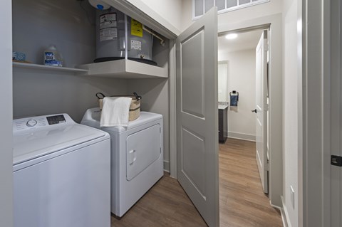 A laundry room with a washer and dryer.