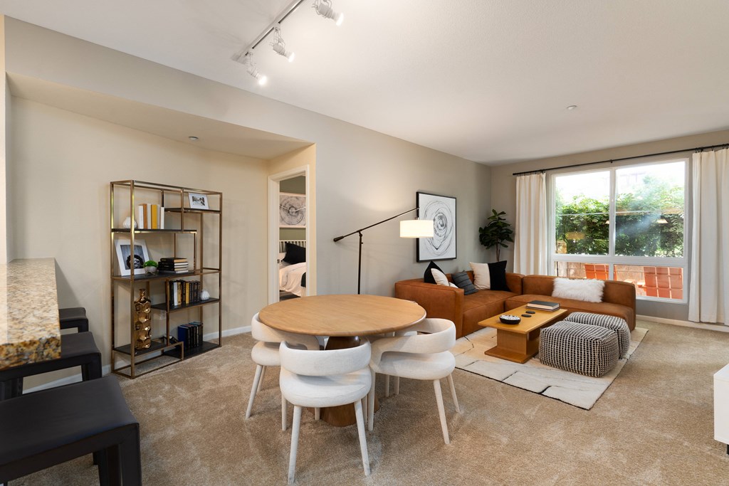 a living room with a table and a couch