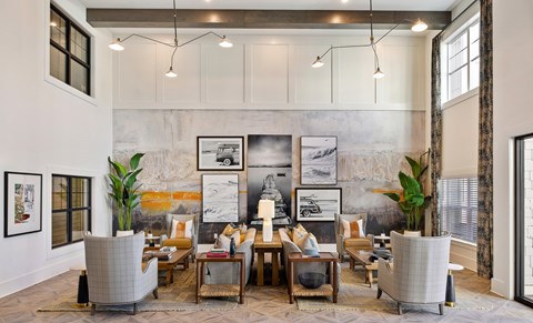 A living room with a grey sofa and a coffee table.