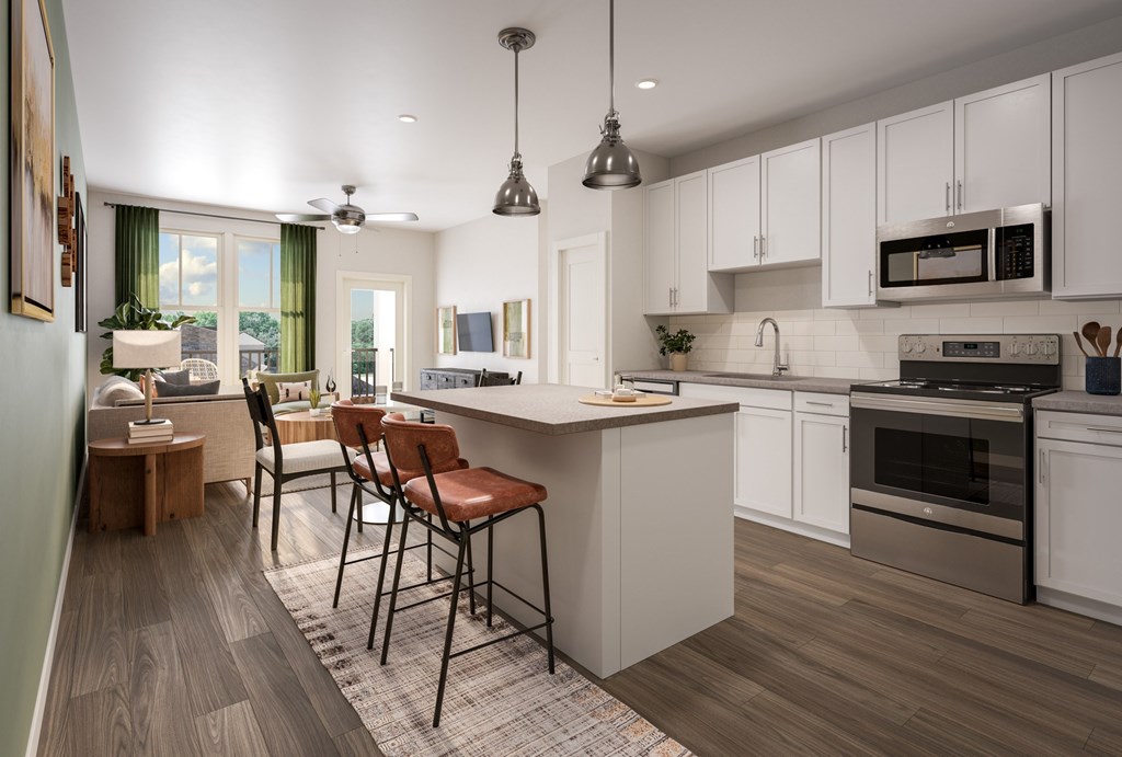 A modern kitchen with island at Easton at Mountain Island luxury apartments in Charlotte, NC.