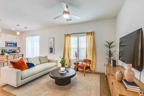 a living room with a couch and a coffee table