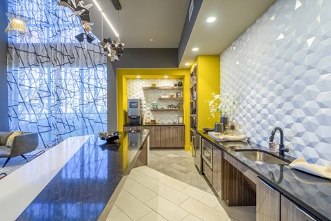 a kitchen with a counter top and a sink