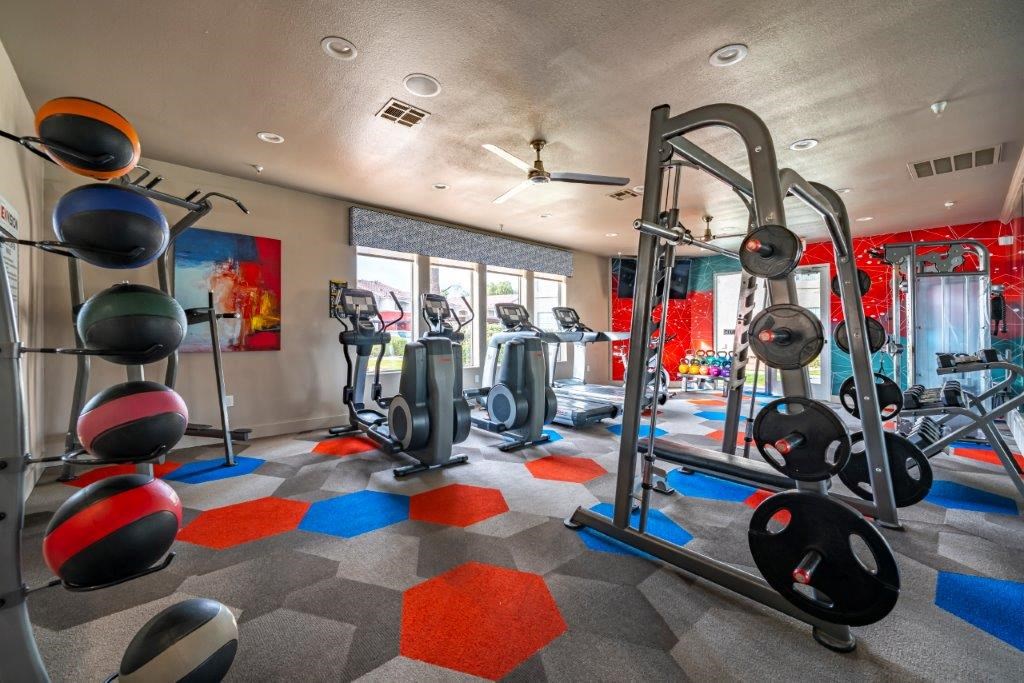 a gym with weights and other exercise equipment