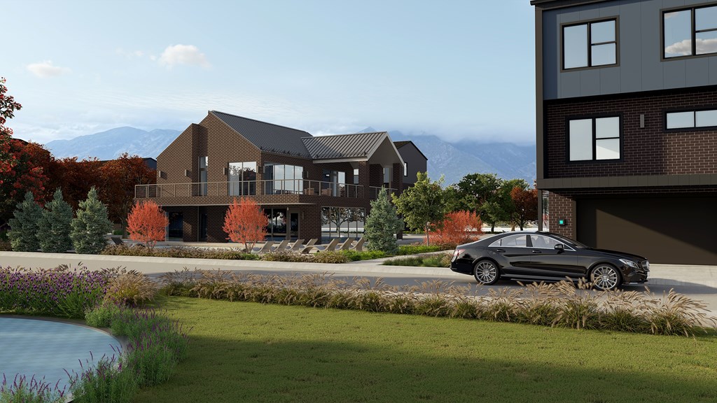 A black car is parked in front of a modern house.