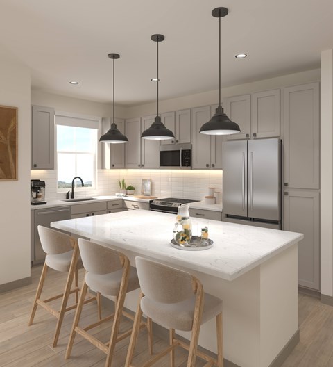 A modern kitchen with a white marble island and wooden chairs.