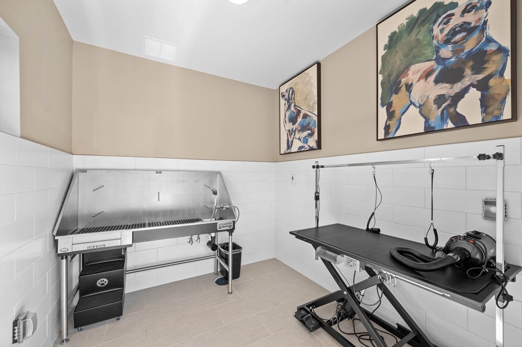 a kitchen with a sink and a stove and a table
