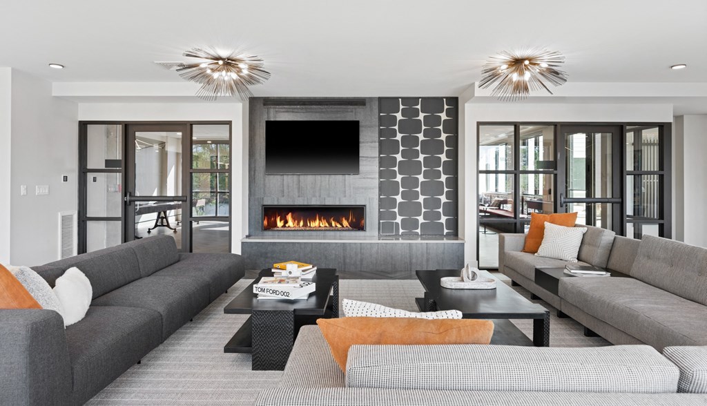 resident lounge living room with couches and a fireplace