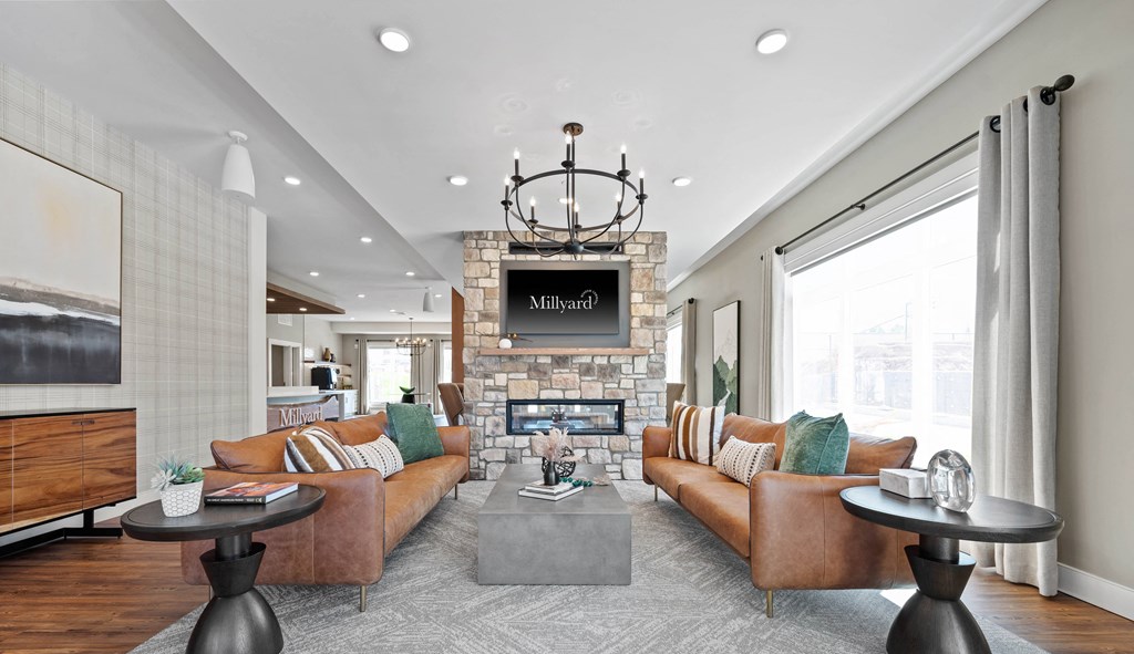 a living room with couches and a fireplace