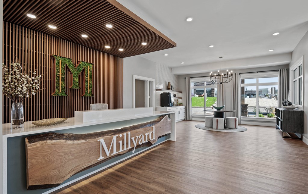 the lobby of a hotel with a reception desk