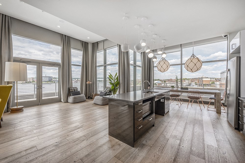 Entertainment kitchen are with large window overlooking the ocean