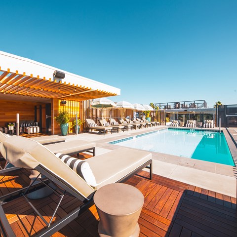 rooftop swimming pool with lounge chairs