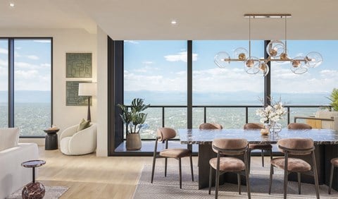 A modern dining room with a view of the city.