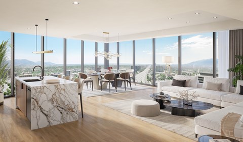 A modern living room with a marble island and a view of the city.