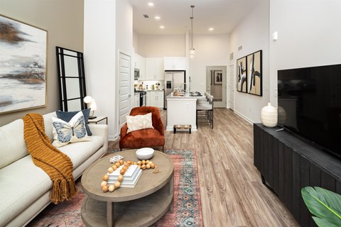 a living room with a couch and a table