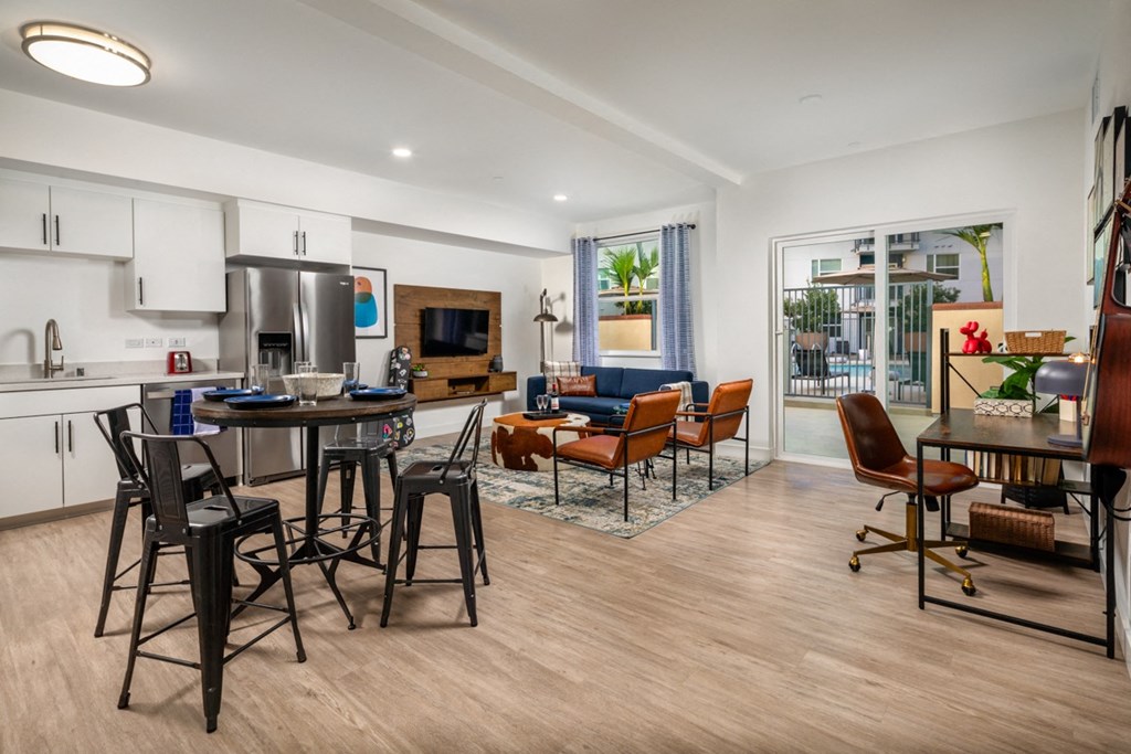 apartment with large living room and tv in Aston at Gateway apartments in El Monte