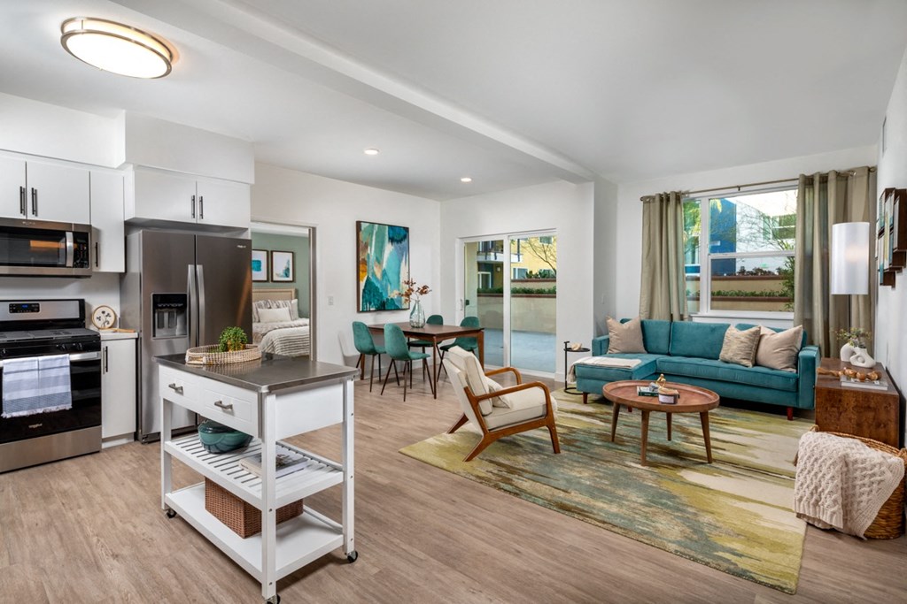 open floorplan living room and kitchen at Aston at Gateway apartments in El Monte, California