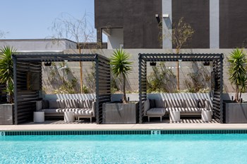 Pool with cabanas and lounge seating - Photo Gallery 35