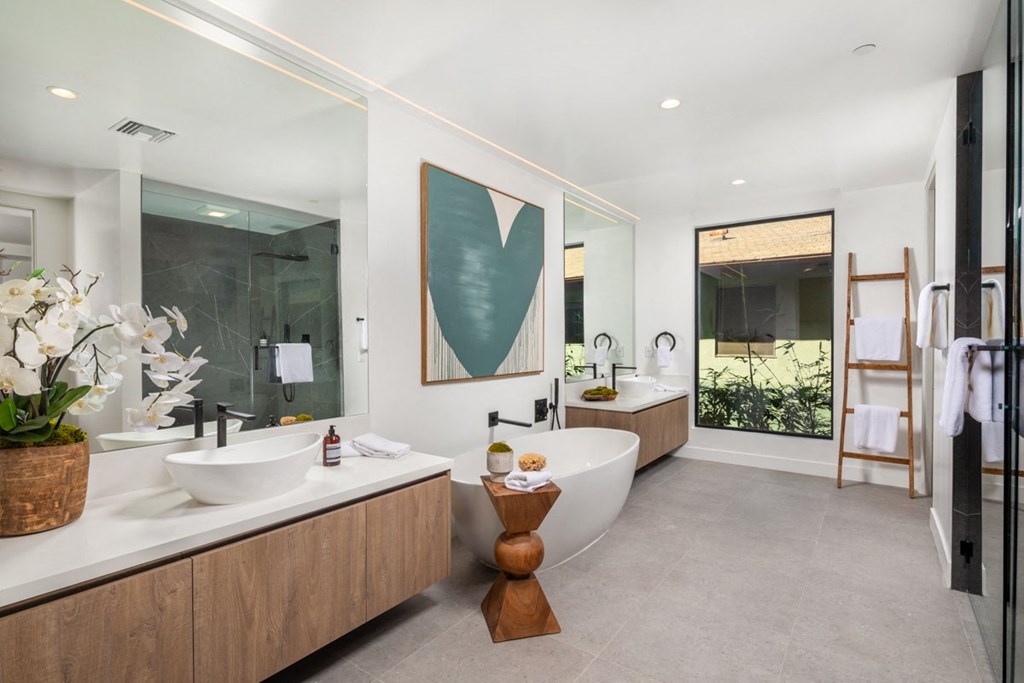 primary bathroom with standalone bath tub