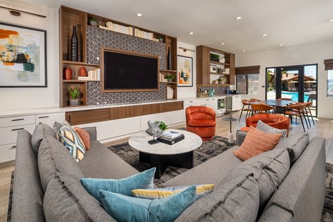 a living room with a couch and a television