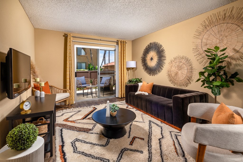 a living room with a couch and a table