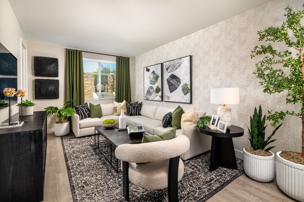 a 1-bedroom living room with a couch and a table