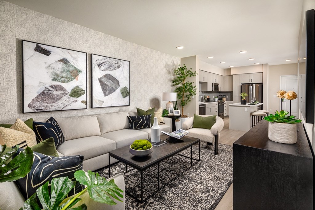 a 1-bedroom living room with a couch and a table