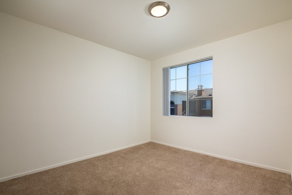 Empty room with a window and carpet at Casoleil,  92154
