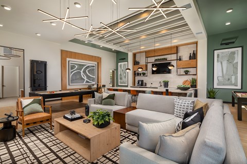 a living room with couches and a coffee table