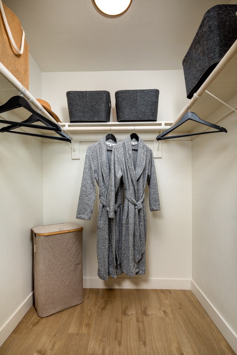 A bathroom with a towel hanging on a rack.