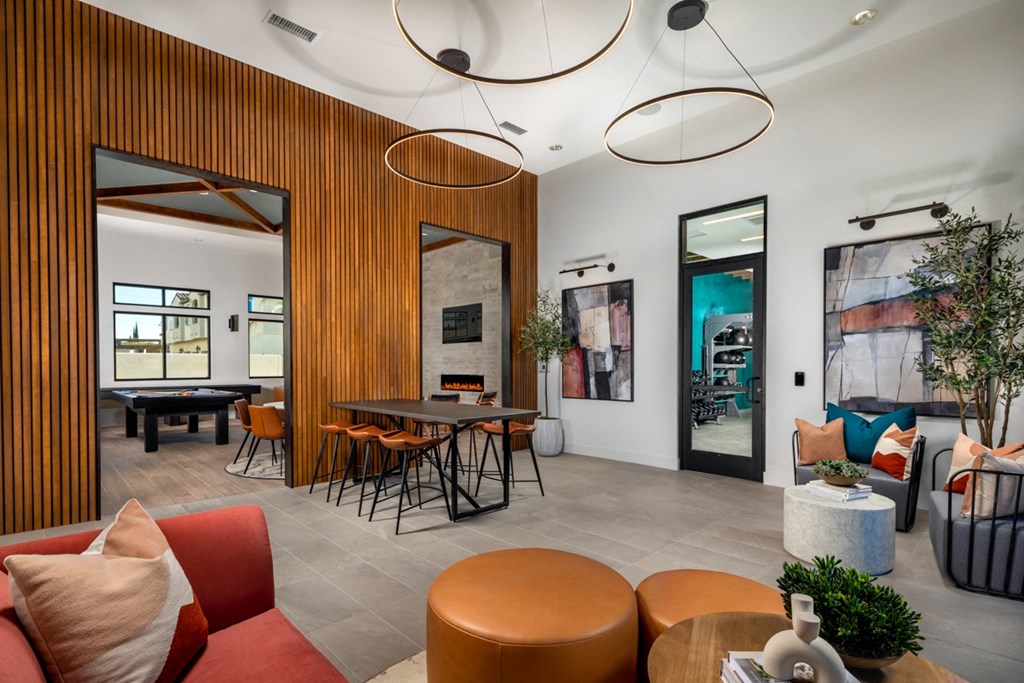 a view of the clubhouse with a pool table and a ping pong table