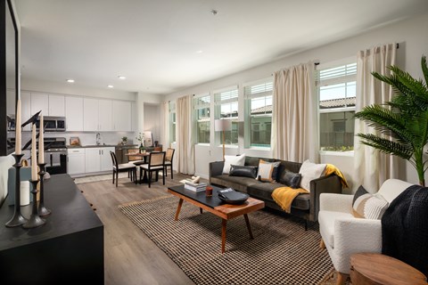 a living room with a couch and a table