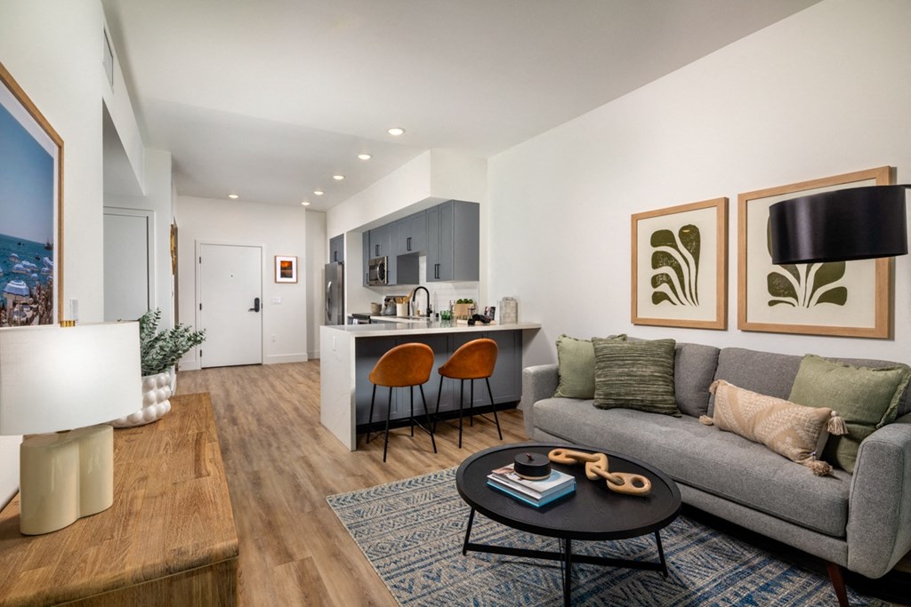 a living room with a couch and a table