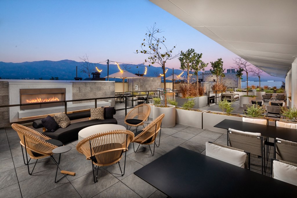 rooftop with seating and fireplace