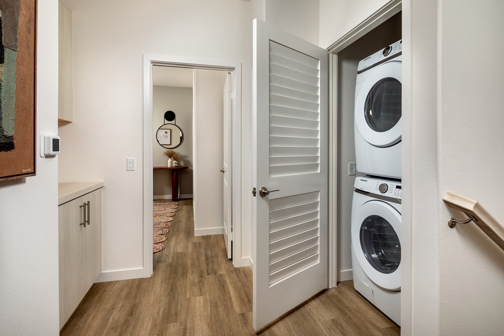 a laundry room with a washer and dryer