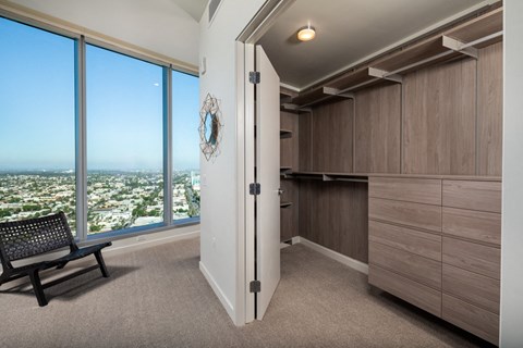 a walk in closet in a 555 waverly unit