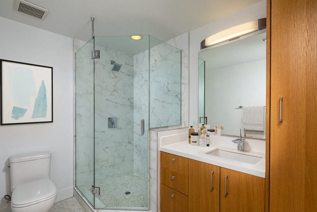 a bathroom with a toilet sink and shower  at The LC, Los Angeles, CA
