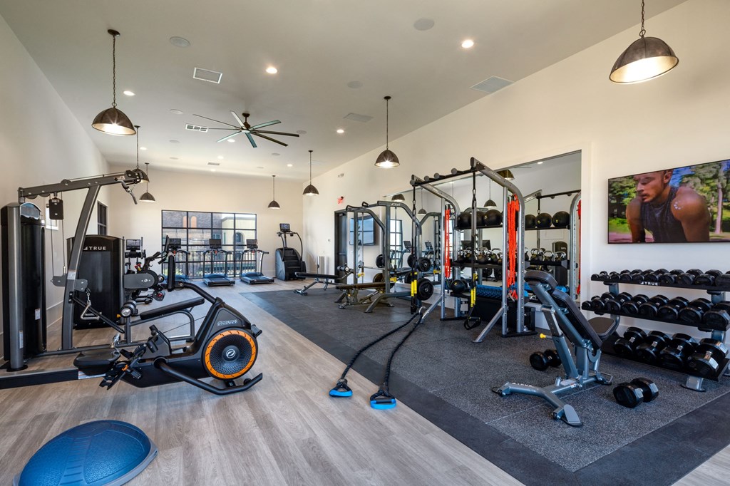 the estates at tanglewood| fitness center with weights and cardio equipment