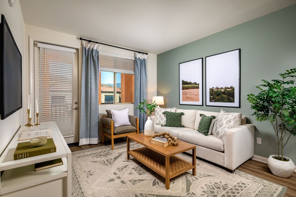a living room with a couch and a coffee table