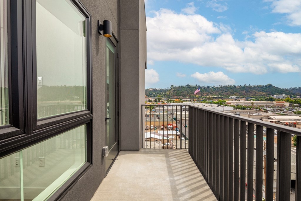 a balcony with a view of a city at VORA LUX, San Diego, CA 92120