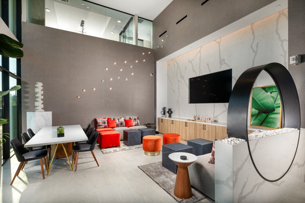 a living room filled with furniture and a flat screen tv at VORA LUX, San Diego, CA 92120