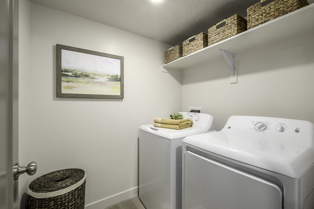 private laundry room with washer and dryer at the preserve at great neck apartments