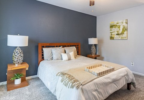 Bedroom with bed at Greenhouse Apartments, Kennesaw, GA