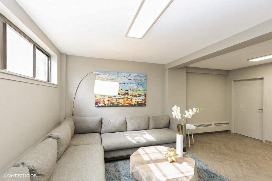 a living room with a couch and a coffee table