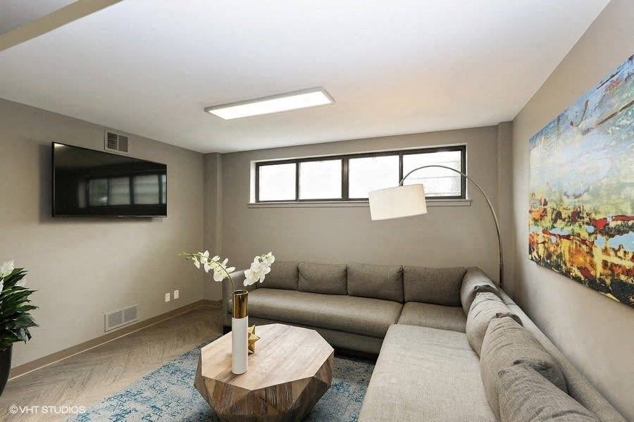 a living room with a couch and a coffee table