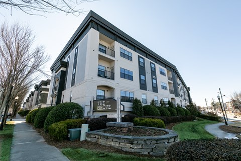 an apartment building with a sign that reads the globe