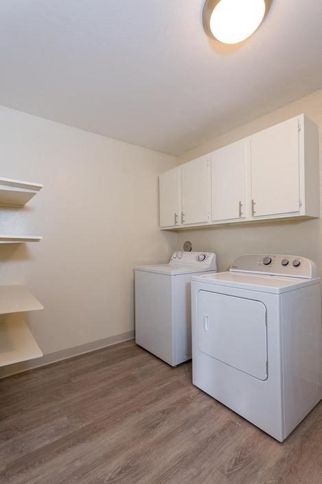 a room with a washer and a dryer in it