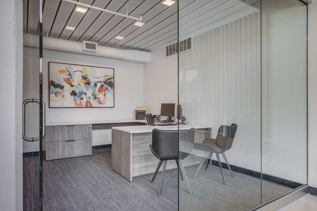 Leasing office with desk, chairs and artwork at Harvest, Salt Lake City, 84103